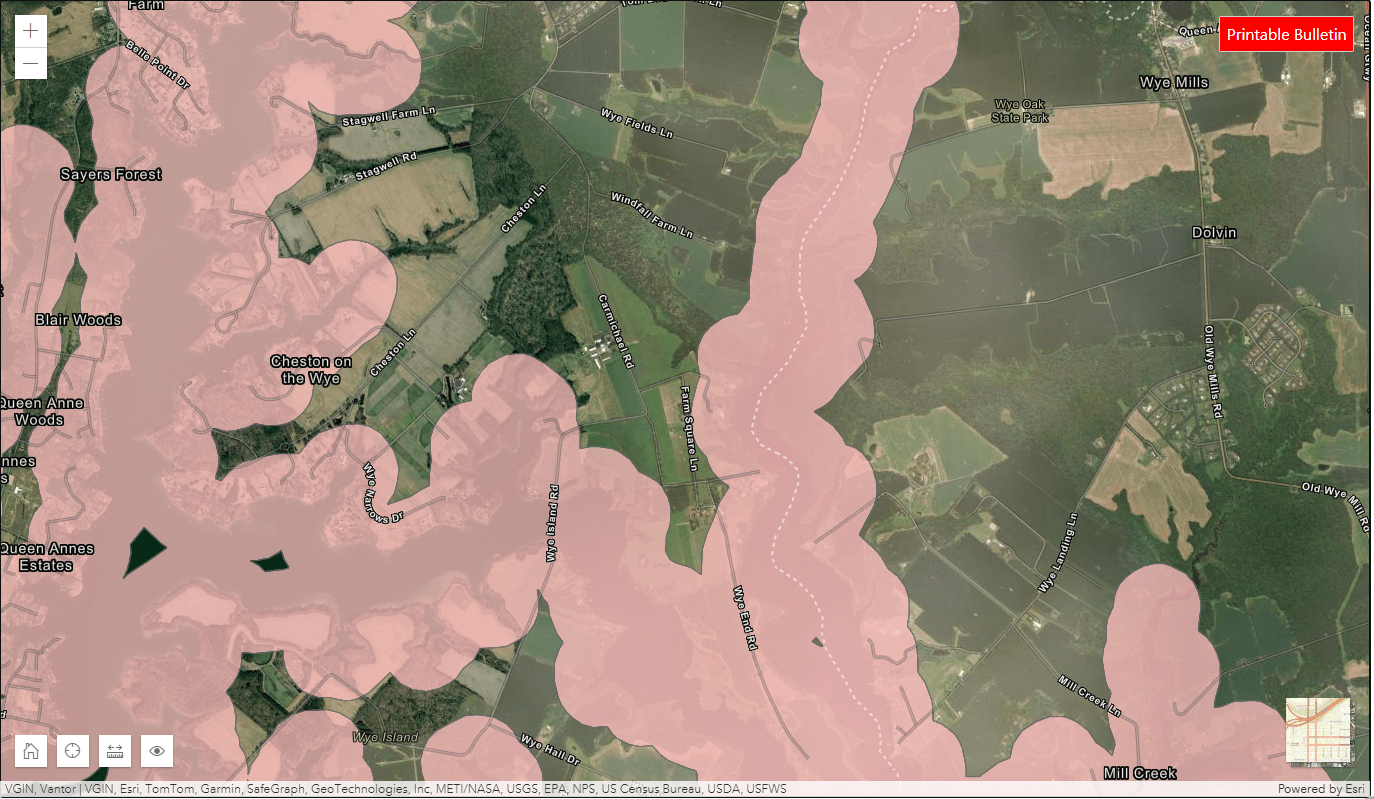 Satellite-style map centered on the Wye Research and Education Center in Queen Anne’s County, Maryland, showing a mix of farm fields, wooded areas, and nearby waterways. Surrounding roads and landmarks include Wye Island Road, Farm Lane, and Wye Mills, with the Wye River running north–south along the right side. Semi-transparent pink shading overlays large portions of the map, indicating a mapped zone or coverage area extending across farmland and forested regions near the research center.