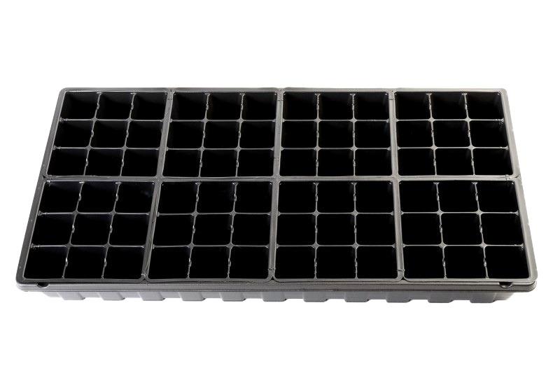 Eight 9-well cell packs fit into a standard plastic greenhouse flat with no leftover space.