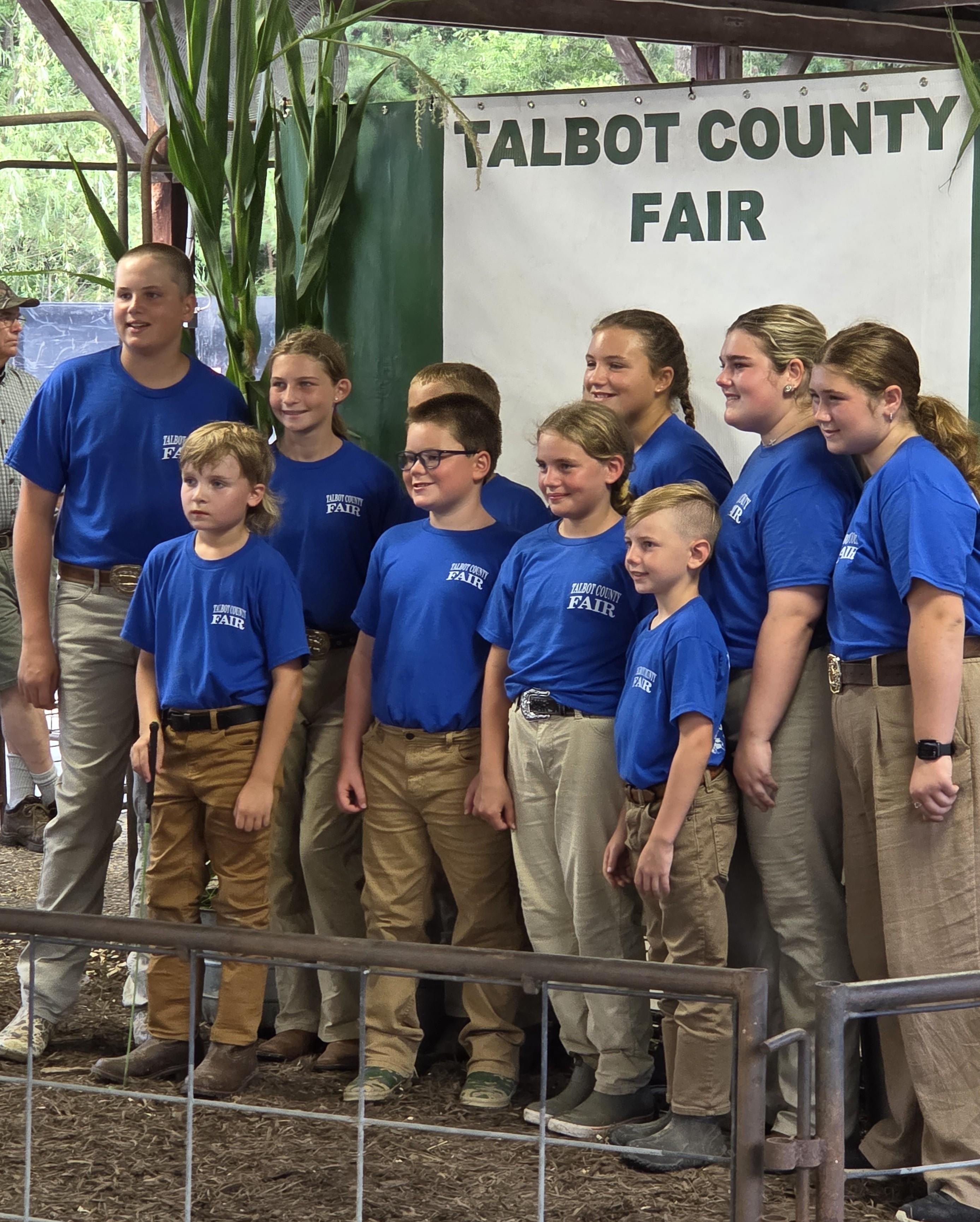 A group of 4-H members posing for a photograph.