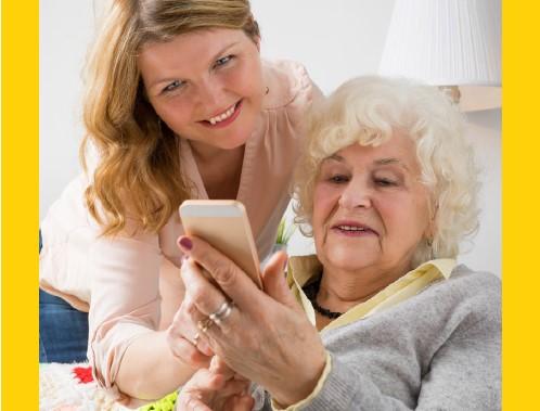 An elderly woman seeks advice from her grandniece on effectively using financial technology for elder care support.