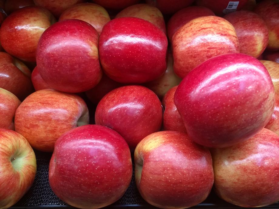 A vibrant stack of red apples.