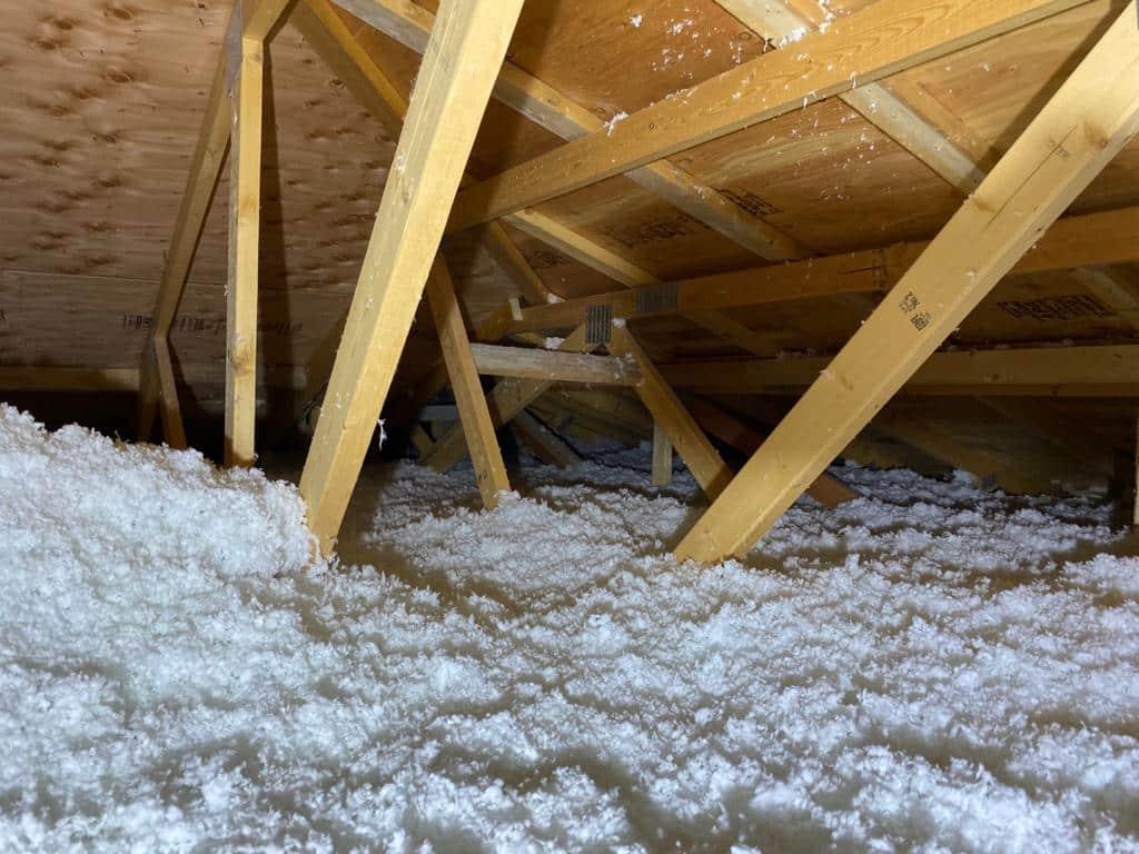 Blown-in insulation in attic