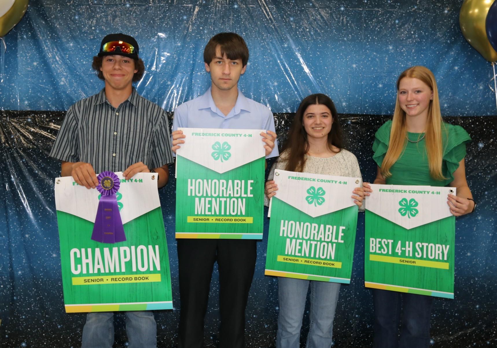 4-H members receiving awards at the annual awards ceremony