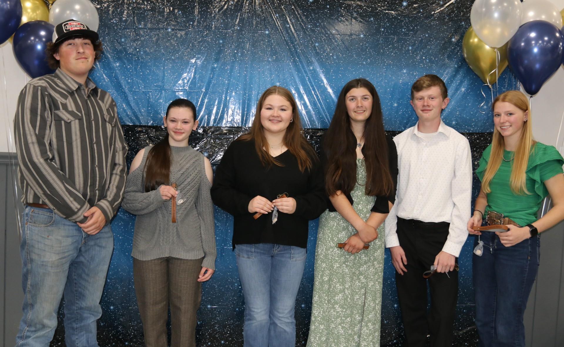 4-H members receiving awards at the annual awards ceremony